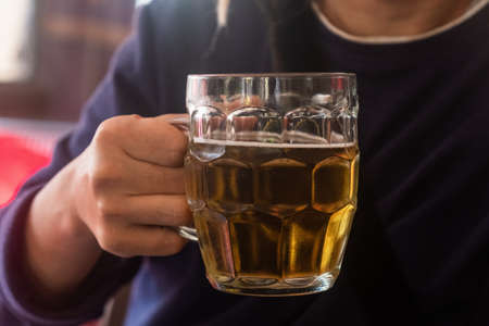 Man drinking traditional pint of real ale beer.の写真素材