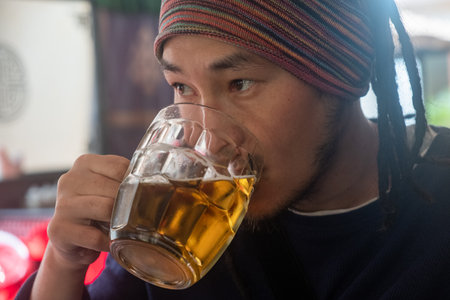 Man drinking traditional pint of real ale beer.の写真素材