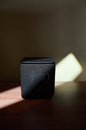 Modern Smart Speaker on Wooden Surface