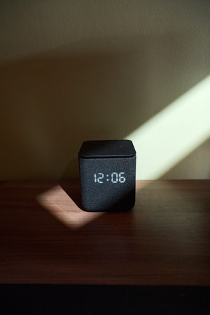 Modern Speaker on Wooden Surface with a sun light
