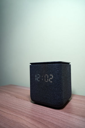 Modern Smart Speaker on Wooden Surface