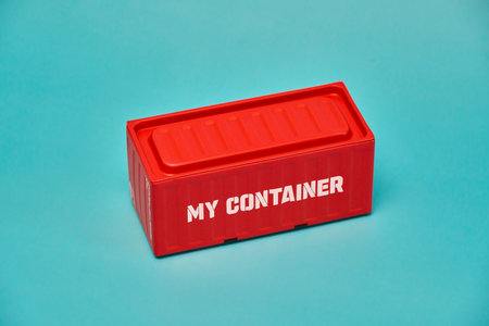 Red Shipping Container on Blue Background