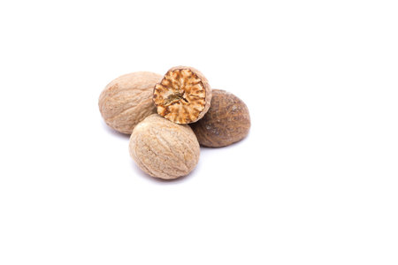 Nutmeg isolated on white background