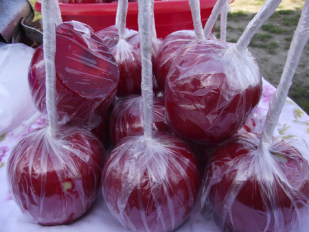 Red sugared pretty sweet apples.の写真素材