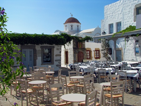 City square café with a church behindのeditorial素材