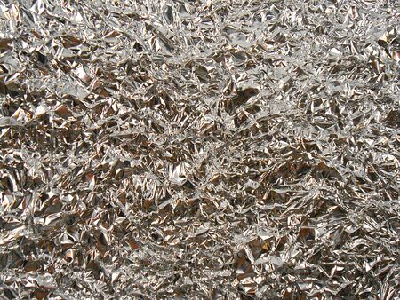 the background of crumpled foilの写真素材