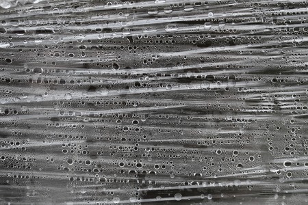 texture of a stretched film with water droplets backgroundの写真素材