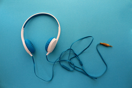 headphones blue color on the background of the same colorの写真素材
