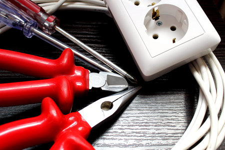tools for an electrician for installing sockets