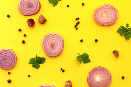 Purple sliced ??juicy pepper onions and green parsley garlic