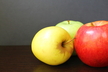 Apples fresh juicy three colors of taste and varietyの写真素材