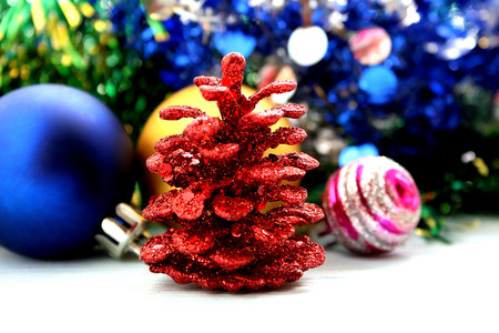 Christmas bright toys and cones for spruceの写真素材