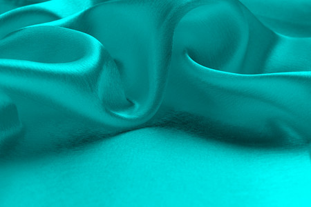 soft drape from satin fabric turquoise colorの写真素材