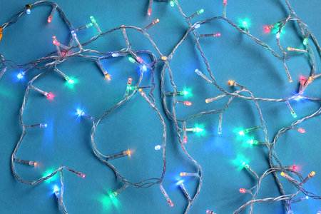 Colored garland on a blue background