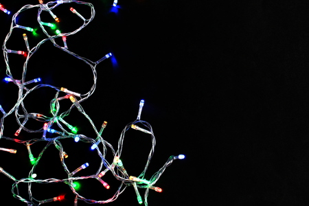 Colorful garland on a black backgroundの写真素材