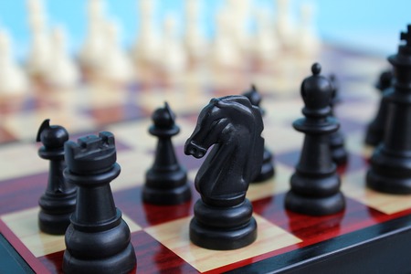 chess pieces placed on a checkered boardの写真素材