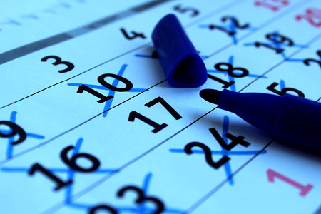 On the table is a calendar sheet.の写真素材