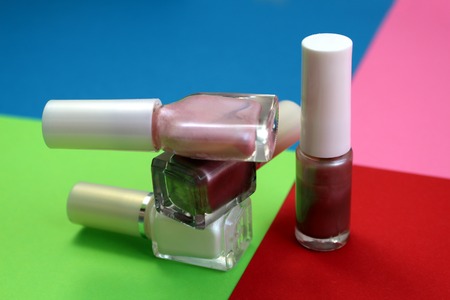 nail polish on a bright color backgroundの写真素材