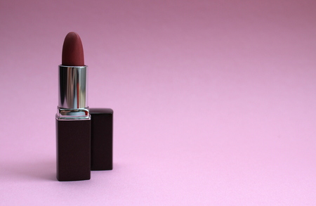 Pink lipstick standing on a pink background inの写真素材