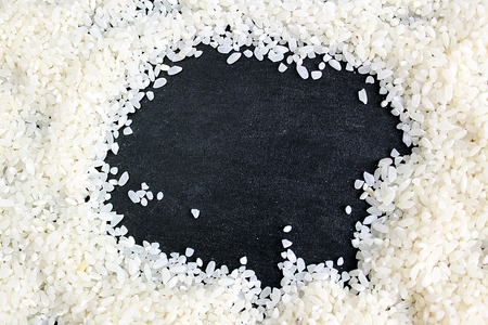 texture white rice raw round grain backgroundの写真素材