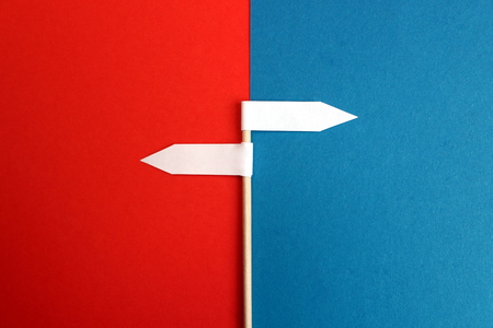 Arrows two shows a different direction made of paperの写真素材