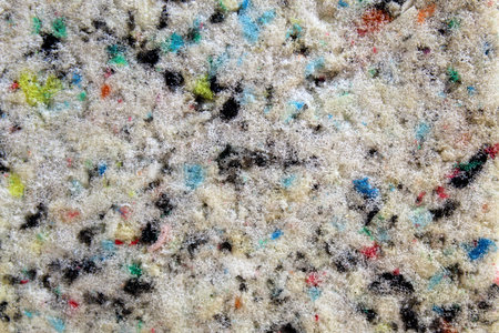 Abstract gray surface with different spots of different sizes and colors