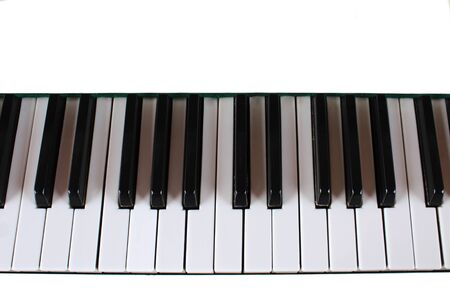 Close-up of piano keys in white and blackの写真素材