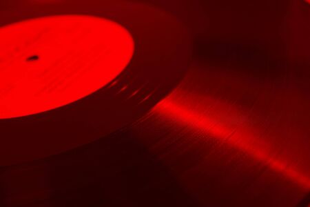 abstract background retro vinyl disc red colorの写真素材