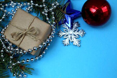 Christmas boxes and toys on a blue background with place for text.の写真素材