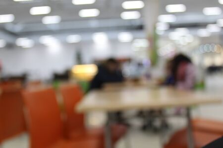 Blurred photo of a cafe in a shopping centerの写真素材