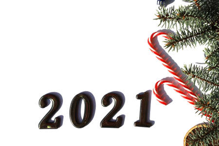 fir branches with Christmas decorations lie on a white background with a place for texの写真素材