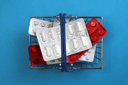 There are a bunch of treatment pills in the shopping cartの写真素材