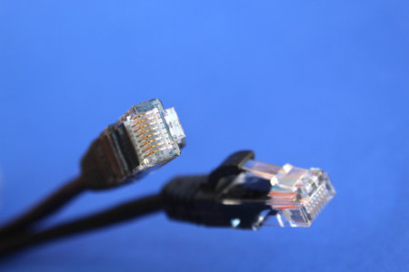 The black plug for communication is on a blue background