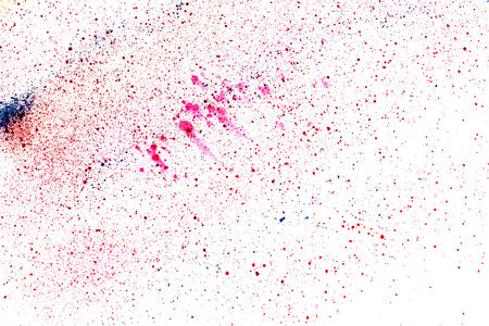 Splashes of paint of bright colors on a white background