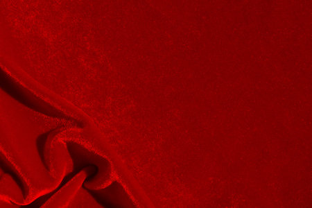 Crumpled velvet fabric texture shining in the sun with place for text