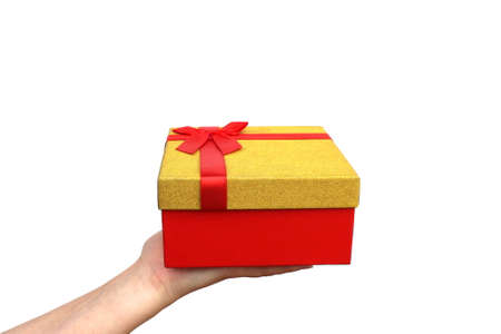 box with a gift on his hand on a white backgroundの写真素材