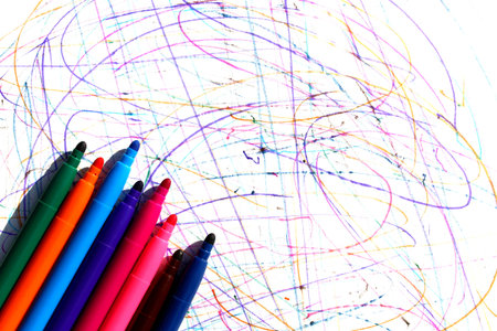 Abstract background. Doodles are drawn on a white background with a felt-tip pen. Bright felt-tip...