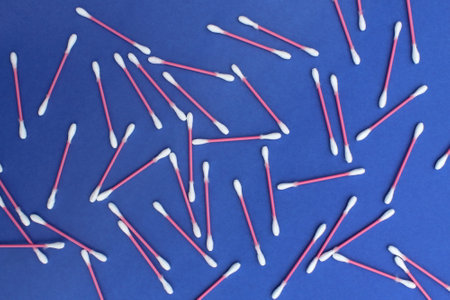 Abstract background of cotton buds on a blue background.の写真素材