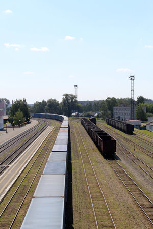 Railway station with freight cars on a summer day.の写真素材