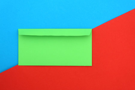 One envelope green lies on two colors at the same time.の写真素材