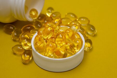 Vitamin Omega-3 Yellow For Your Health Every Dayの写真素材