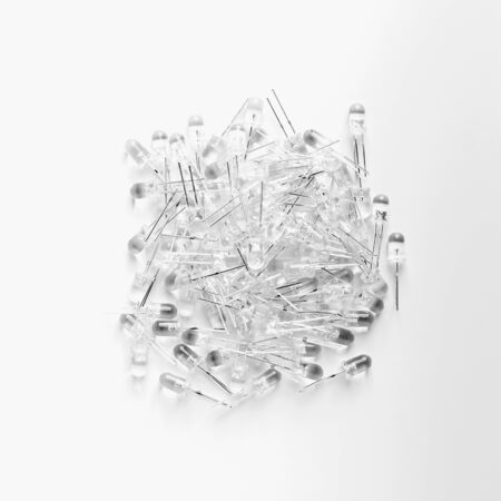 Many transparent LEDs on an isolated background. The transparent led can light warm and cold. It has a different diameter.の写真素材