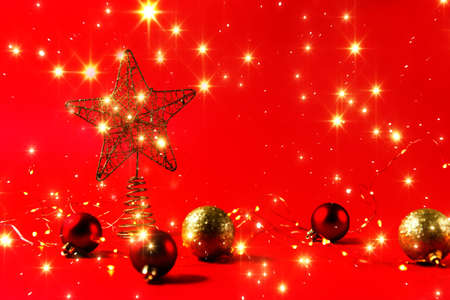 Christmas decorations on a red background. A congratulatory banner.の写真素材