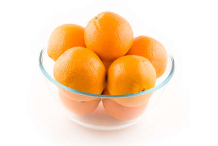 plate whith oranges on the whiteの写真素材