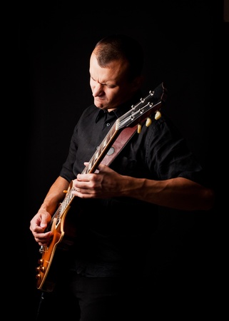 man playing guitarの写真素材