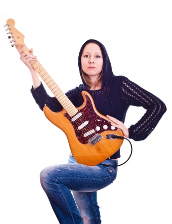 young woman with electric guitarの写真素材