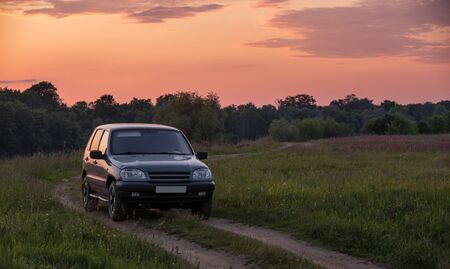 car in the meadowの写真素材