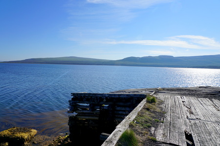 An abandon wooden jetty in the bay.の写真素材