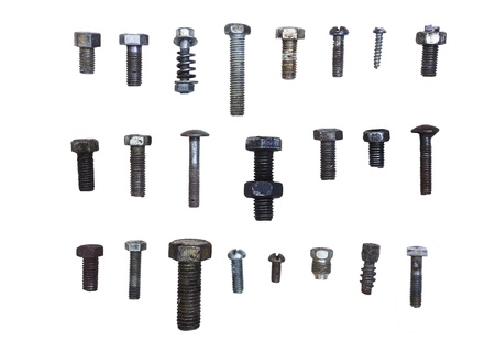 Different old bolts isolated on white backgroundの写真素材