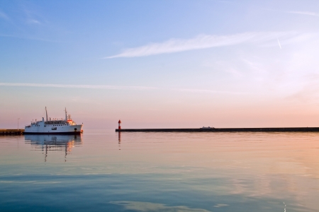 beautiful sunset at sea with the shipの写真素材